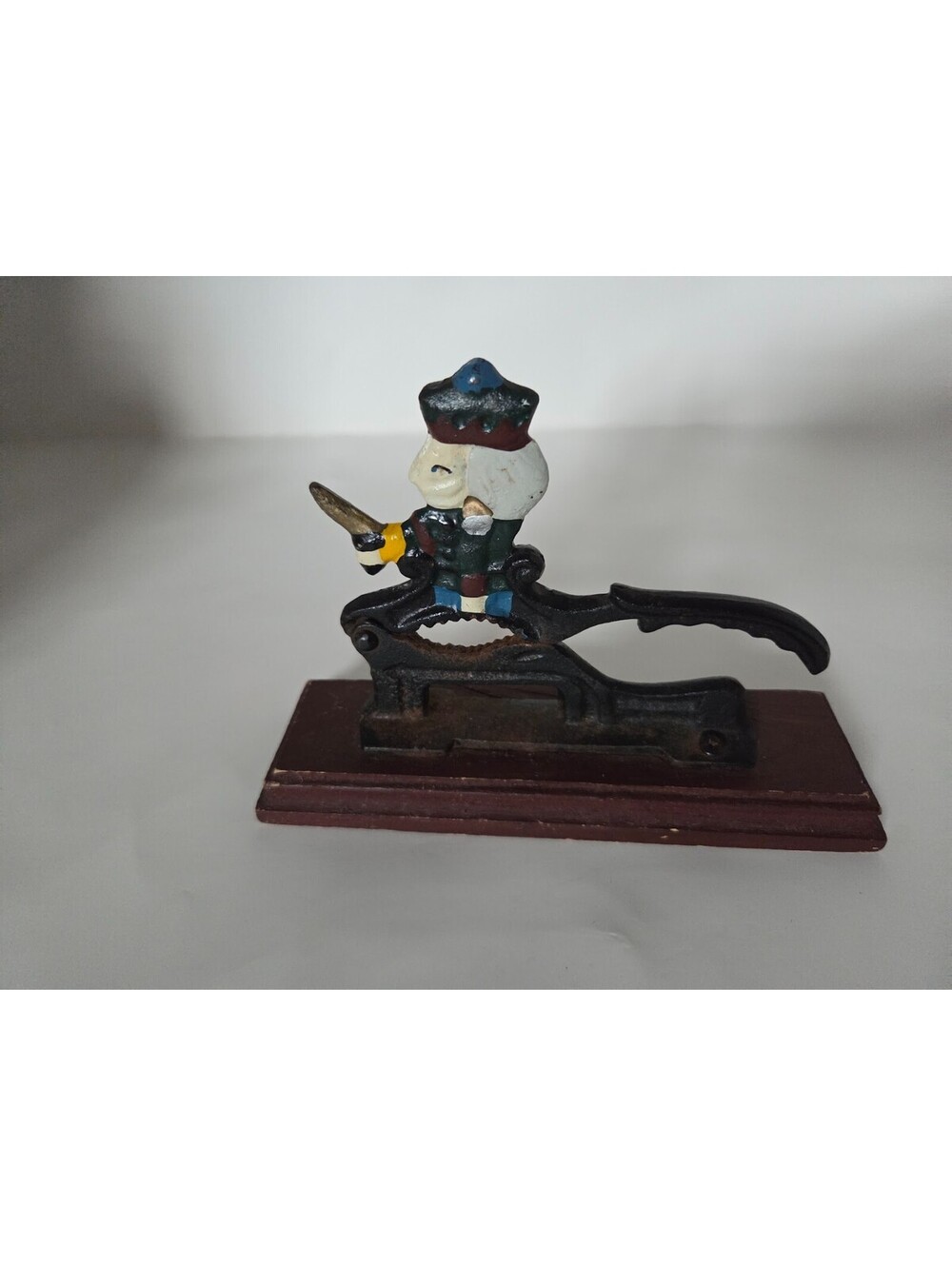 Vintage Cast Iron Figural Nutcracker Novelty Figure on Wood Base